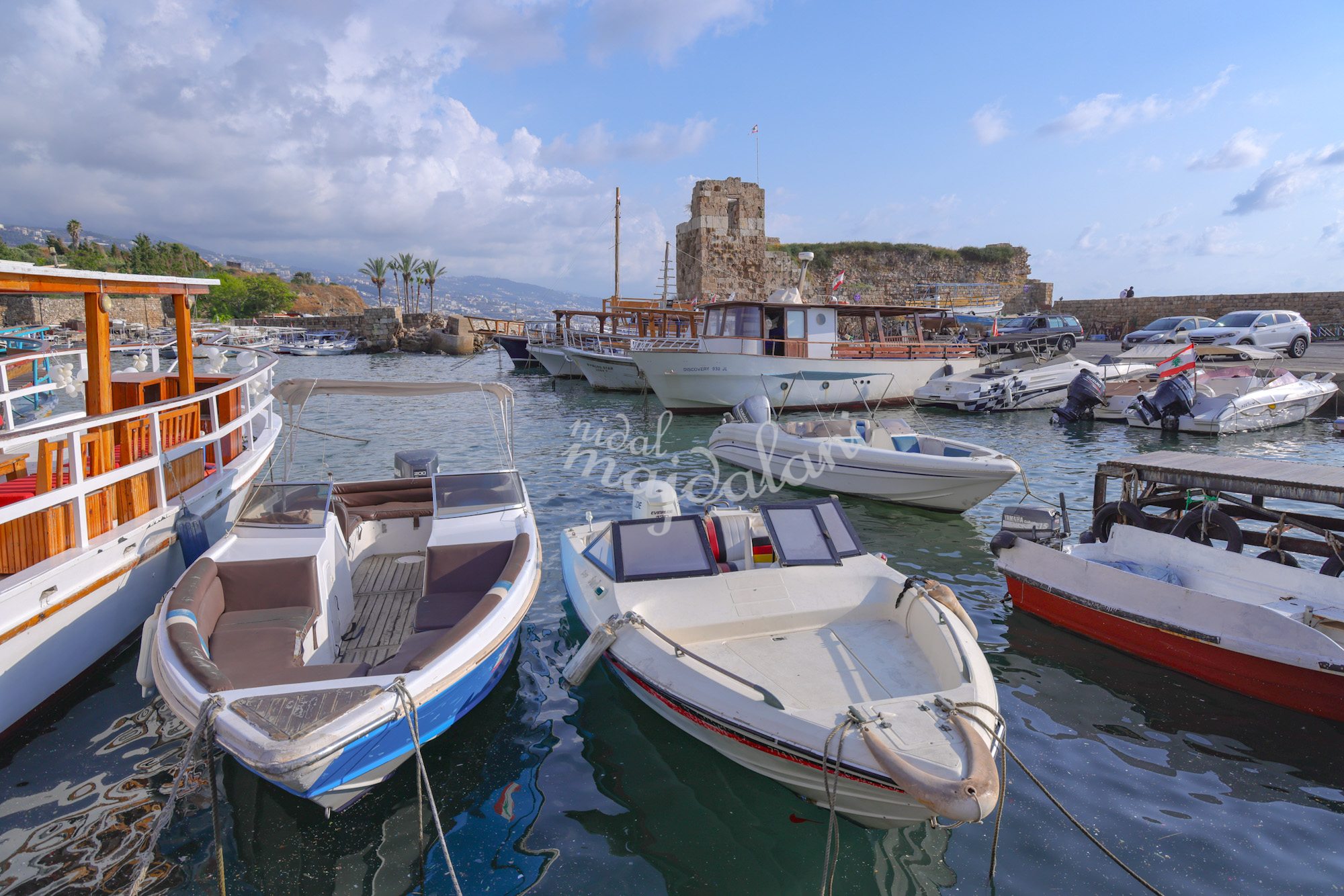 Old harbor of Byblos with fishing boats